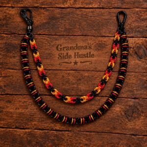 Double Wallet Chain No. 1, two strand handwoven chainmail wallet chain in red, gold and black with a skull head swivel clip and carabiner