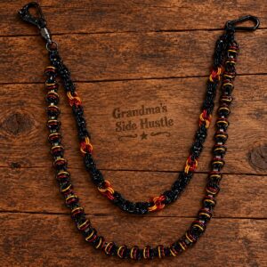 Double Wallet Chain No. 3, two strand handwoven chainmail wallet chain in black with red and gold with a skull head swivel clip and carabiner