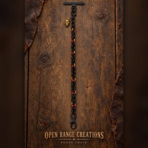 Black with Red and Gold Accents chainmail phone chain with a gold skull charm
