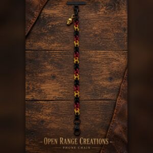 Black, Red and Gold chainmail phone chain with a gold skull charm