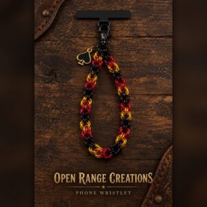Black, Red and Gold chainmail phone wristlet with a black and gold spade charm