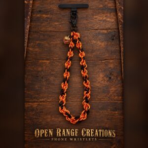 Orange and Black chainmail phone wristlet with an amber crystal charm