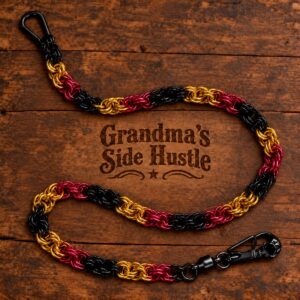 Wallet Chain No. 3, handwoven red, gold and black chainmail wallet chain with a black skull swivel clip and carabiner