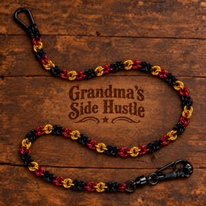 Wallet Chain No. 5, handwoven red, gold and black chainmail wallet chain with a black skull swivel clip and carabiner